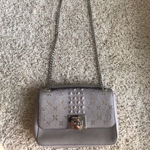 Michael Kor’s Crossbody Multi Function
